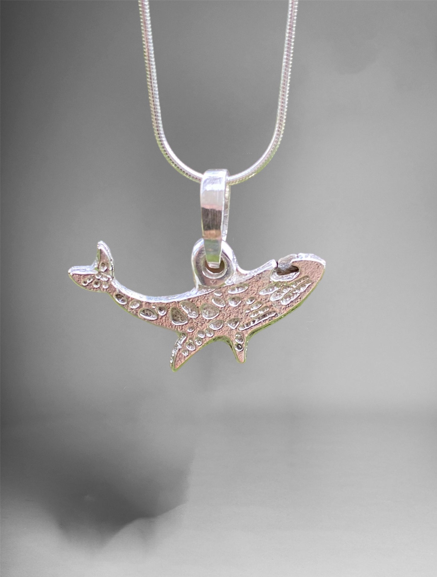 Unique Handcrafted Sand Cast Whale Pendant with Raw Queensland Sapphire Eye