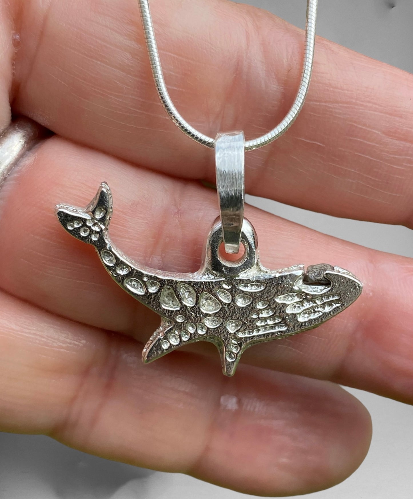 Unique Handcrafted Sand Cast Whale Pendant with Raw Queensland Sapphire Eye