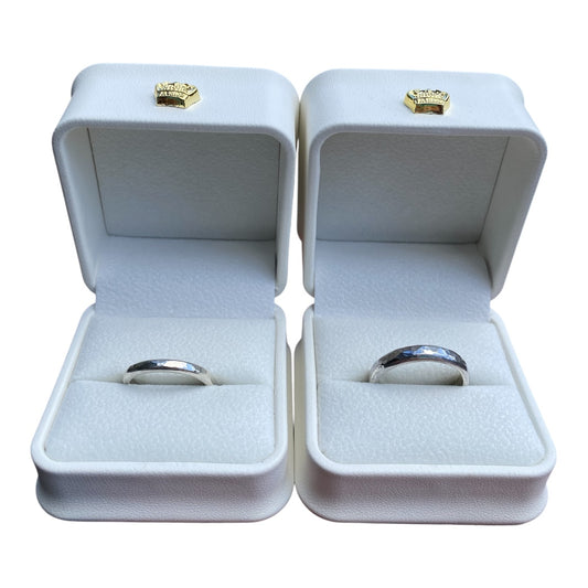 Sterling silver wedding bands, individually hand-forged and textured for Jay and Naomi