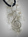 Hand forged Sterling Silver Treble Clef Pendant