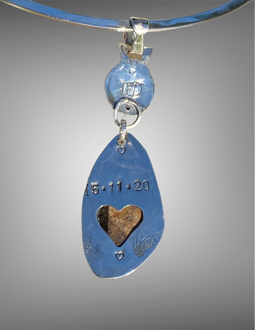 Opal, Blue Topaz and Emerald Pendant sold